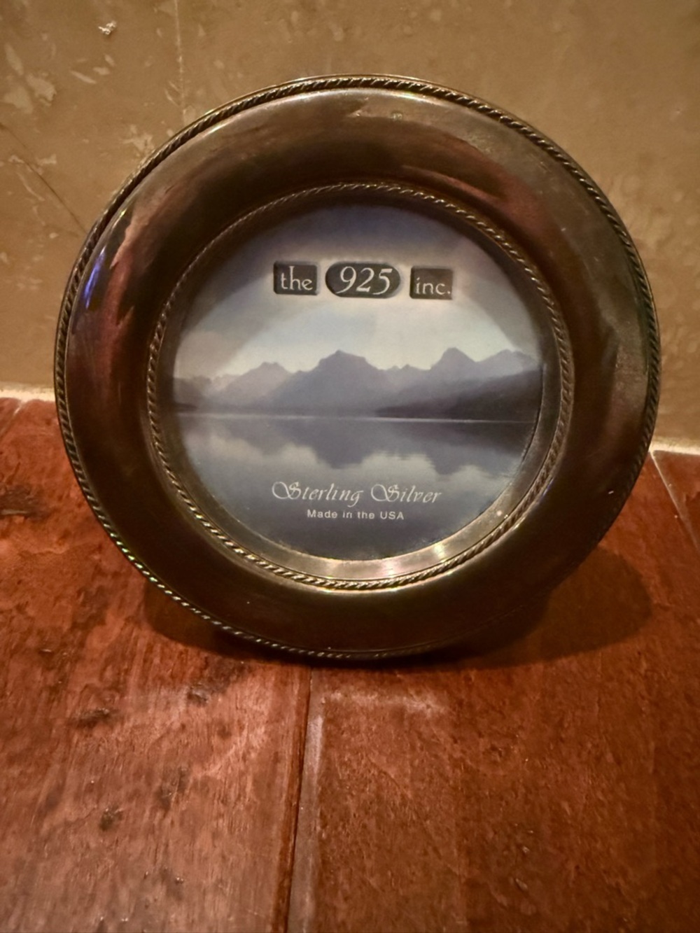 The 925 Inc. Sterling Silver Round Picture Frame - Silver. 5 3/4”